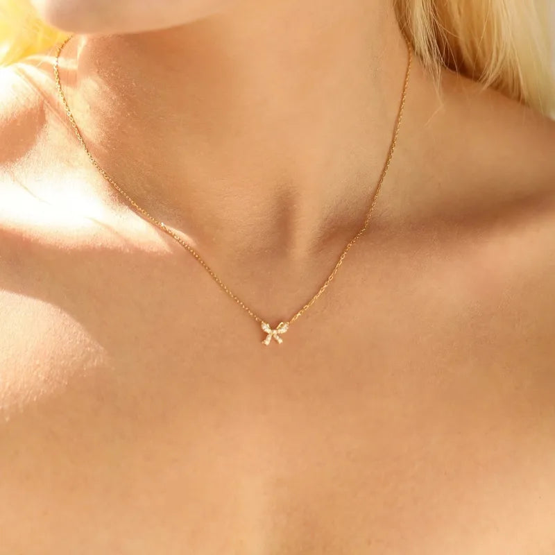 Collar de nudo - baño en oro