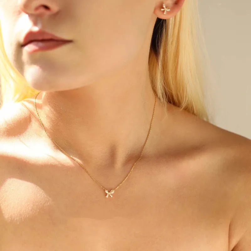 Collar de nudo - baño en oro